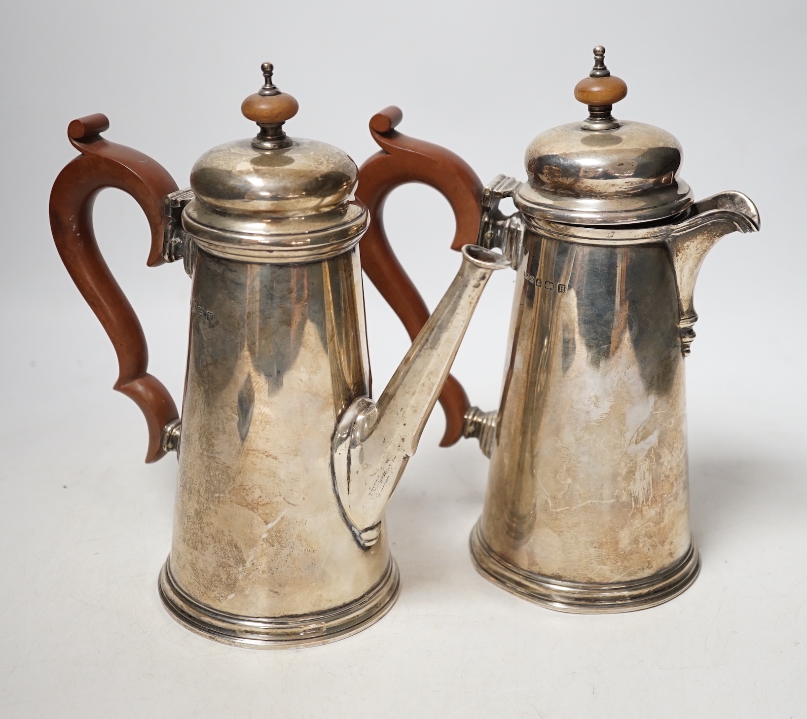 A George V silver cafe au lait pair, by F.C. Richards, Birmingham, 1932, height 19.7cm, gross weight 25.5oz.